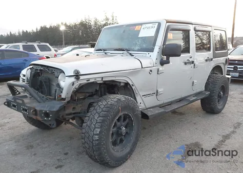 2011 Jeep Wrangler Unlimited Sport z USA, uszkodzony, nr VIN 1J4BA3H14BL625484